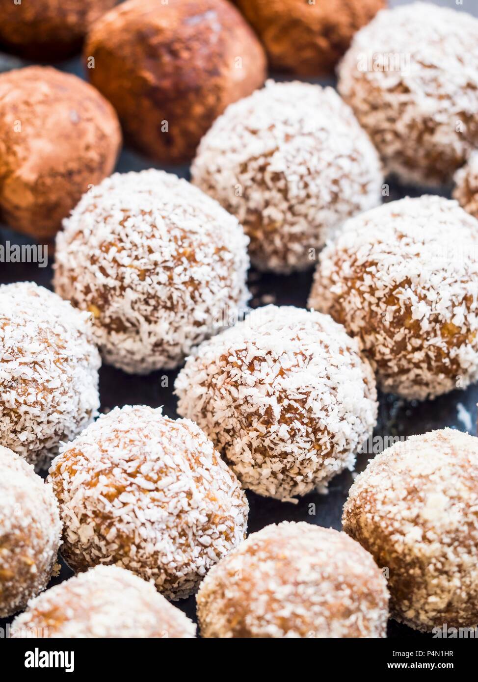 Homemade peanut butter energy protein balls with coconut flakes Stock