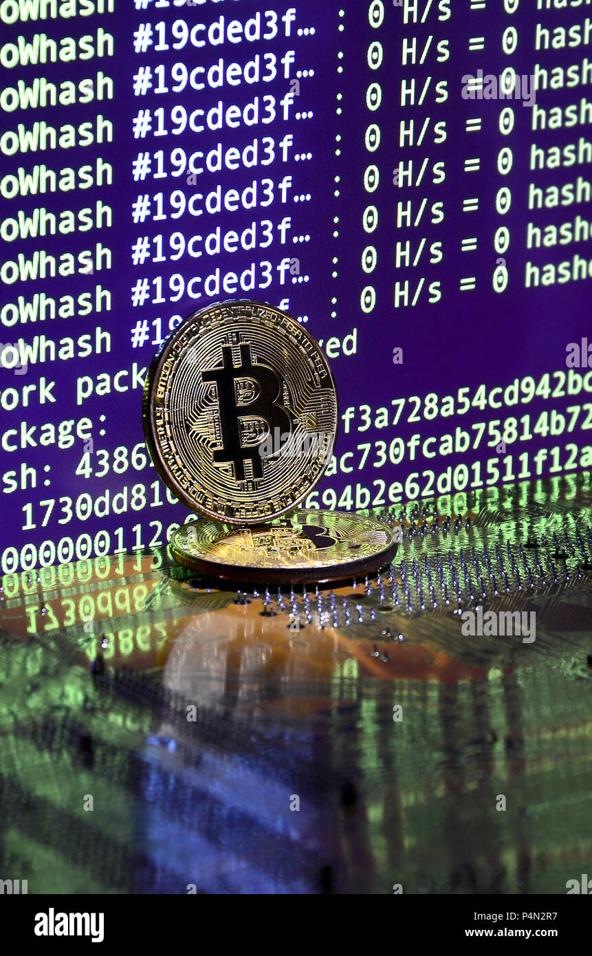 The digital process of cryptocurrency mining by using the GPUs. Bitcoins  and video card on a working display and mining screen Stock Photo - Alamy