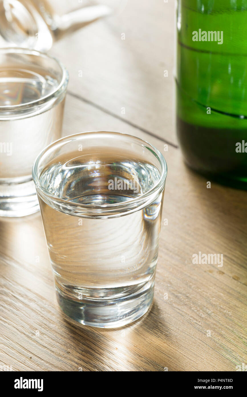 Alcoholic Clear Distilled Korean Soju in a Shot Glass Stock Photo