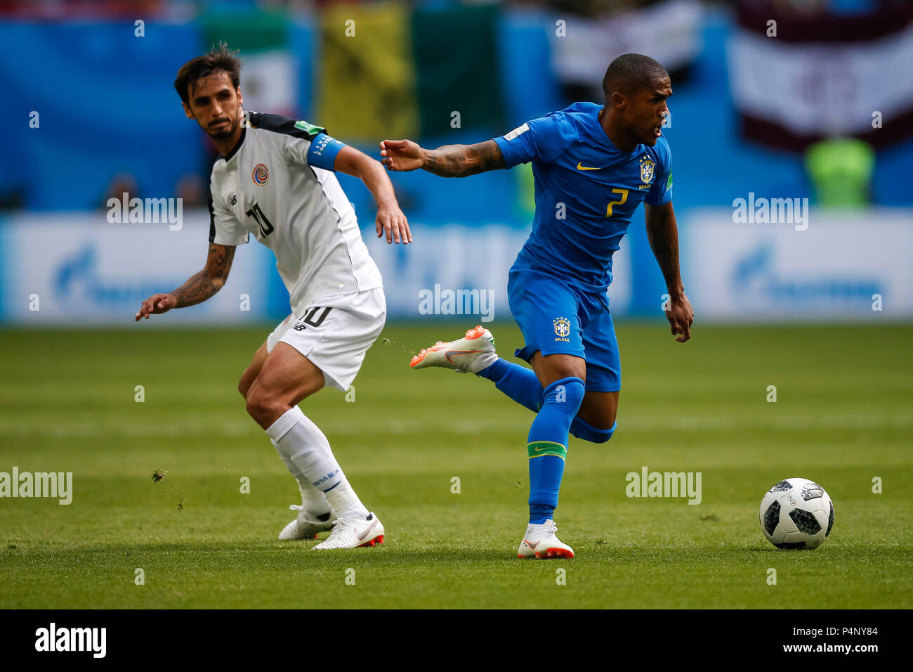 Saint Petersburg, Russia. 22nd June 2018. Bryan Ruiz of Costa Rica and Douglas Costa of Brazil during the 2018 FIFA World Cup Group E match between Brazil and Costa Rica at Saint Petersburg Stadium on June 22nd 2018 in Saint Petersburg, Russia. (Photo by Daniel Chesterton/phcimages.com) Credit: PHC Images/Alamy Live News Stock Photo