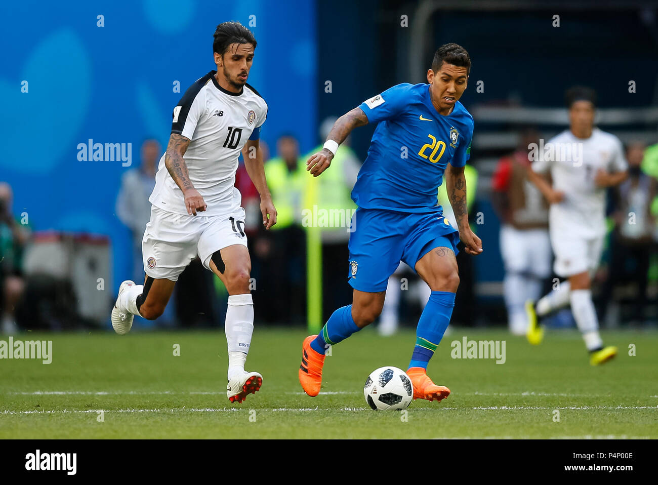 Saint Petersburg, Russia. 22nd June 2018. Roberto Firmino of Brazil and Bryan Ruiz of Costa Rica during the 2018 FIFA World Cup Group E match between Brazil and Costa Rica at Saint Petersburg Stadium on June 22nd 2018 in Saint Petersburg, Russia. (Photo by Daniel Chesterton/phcimages.com) Credit: PHC Images/Alamy Live News Stock Photo
