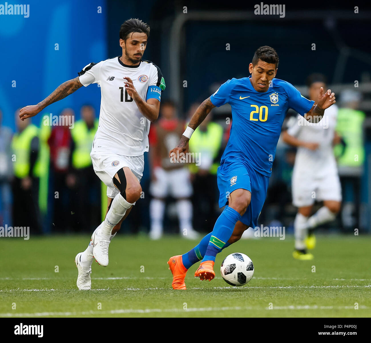 Saint Petersburg, Russia. 22nd June 2018. Bryan Ruiz of Costa Rica and Roberto Firmino of Brazil during the 2018 FIFA World Cup Group E match between Brazil and Costa Rica at Saint Petersburg Stadium on June 22nd 2018 in Saint Petersburg, Russia. (Photo by Daniel Chesterton/phcimages.com) Credit: PHC Images/Alamy Live News Stock Photo
