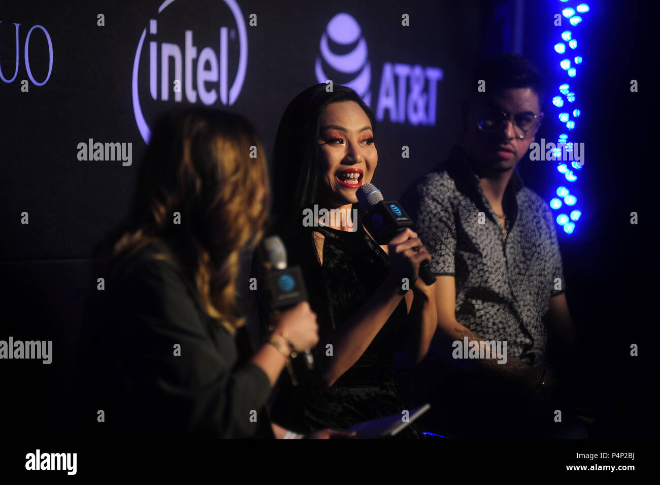 San Francisco, California, USA. 22nd June, 2018. Cellist TINA GUO takes questions from fans before her Pride weekend kick-off concert at AT&T's 1 Powell store. The store is housed in one of San Francisco's oldest buildings and was originally the home of Bank of Italy before it became Bank of America after the 1906 earthquake and fire. AT&T spent 6 months renovating and restoring the building's lobby before opening their flagship store. Credit: Neal Waters/ZUMA Wire/Alamy Live News Stock Photo