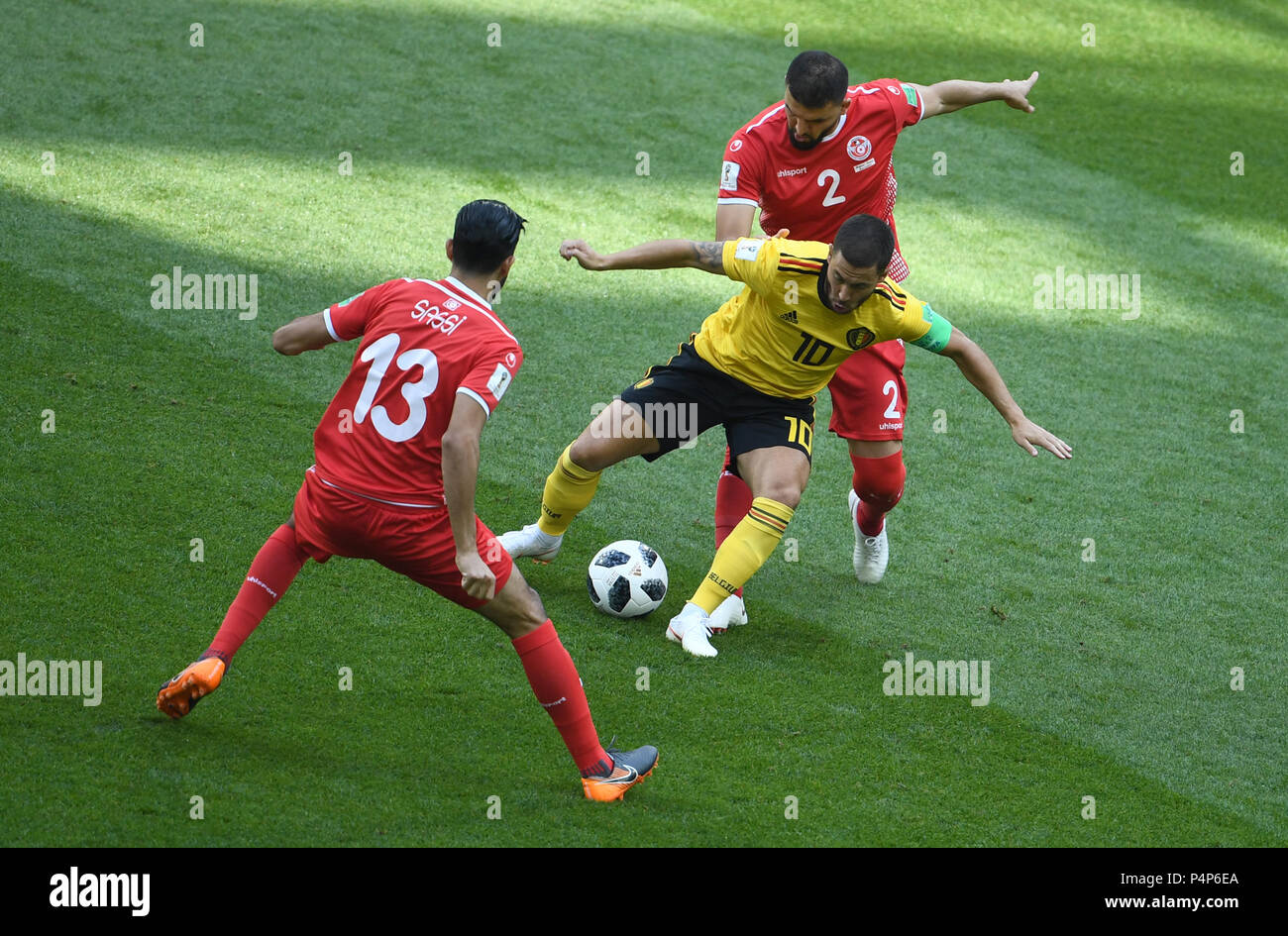 Moscow, Russia. 23rd June, 2018. Soccer: FIFA World Cup, Group G, 2nd matchday, Belgium vs Tunisia at Spartak Stadium: Eden Hazard (C) from Belgium and Syam Ben Youssef (R) and Ferjani Sassi (L) from Tunisia vie for the ball. Credit: Federico Gambarini/dpa/Alamy Live News Stock Photo
