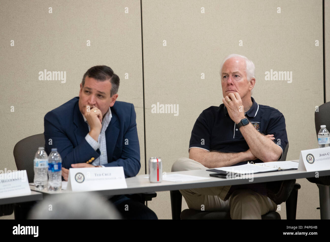 U.S. Senators Ted Cruz, left, and John Cornyn listen as federal and Texas officials and stakeholders meet in a round-table discussion of the immigration crisis hitting the Texas-Mexico border. Confusion and public outrage reigned regarding the Trump administration's policy of separating undocumented immigrant parents from their children after crossing into the U.S. from Mexico. Stock Photo