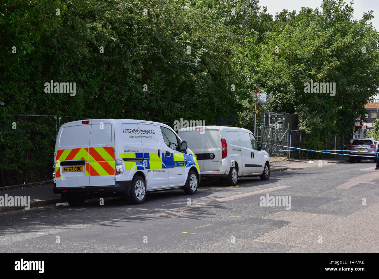 London, United Kingdom. 23 June 2018. Detectives are investigating an unexplained death outside Greenford Station. Police were called to Oldfield Lane North at 01:46BST 23rd June following reports of a fight. Officers and the London Ambulance Service attended and found two unresponsive men aged in their late 30s. The first man was pronounced dead at the scene. Credit: Peter Manning/Alamy Live News Stock Photo