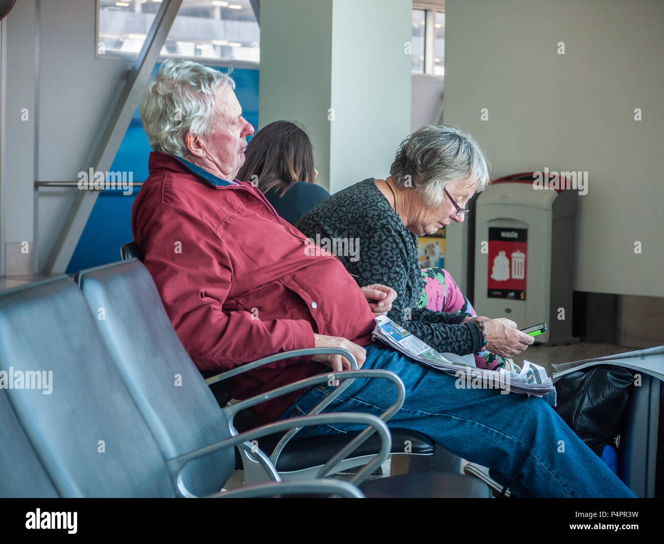Waiting room passengers in airport hi-res stock photography and images ...