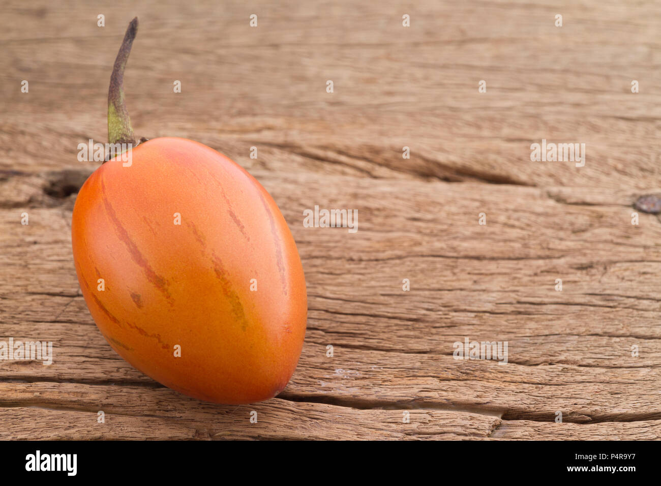 tree tomato fruits on the table (Solanum betaceum) Stock Photo