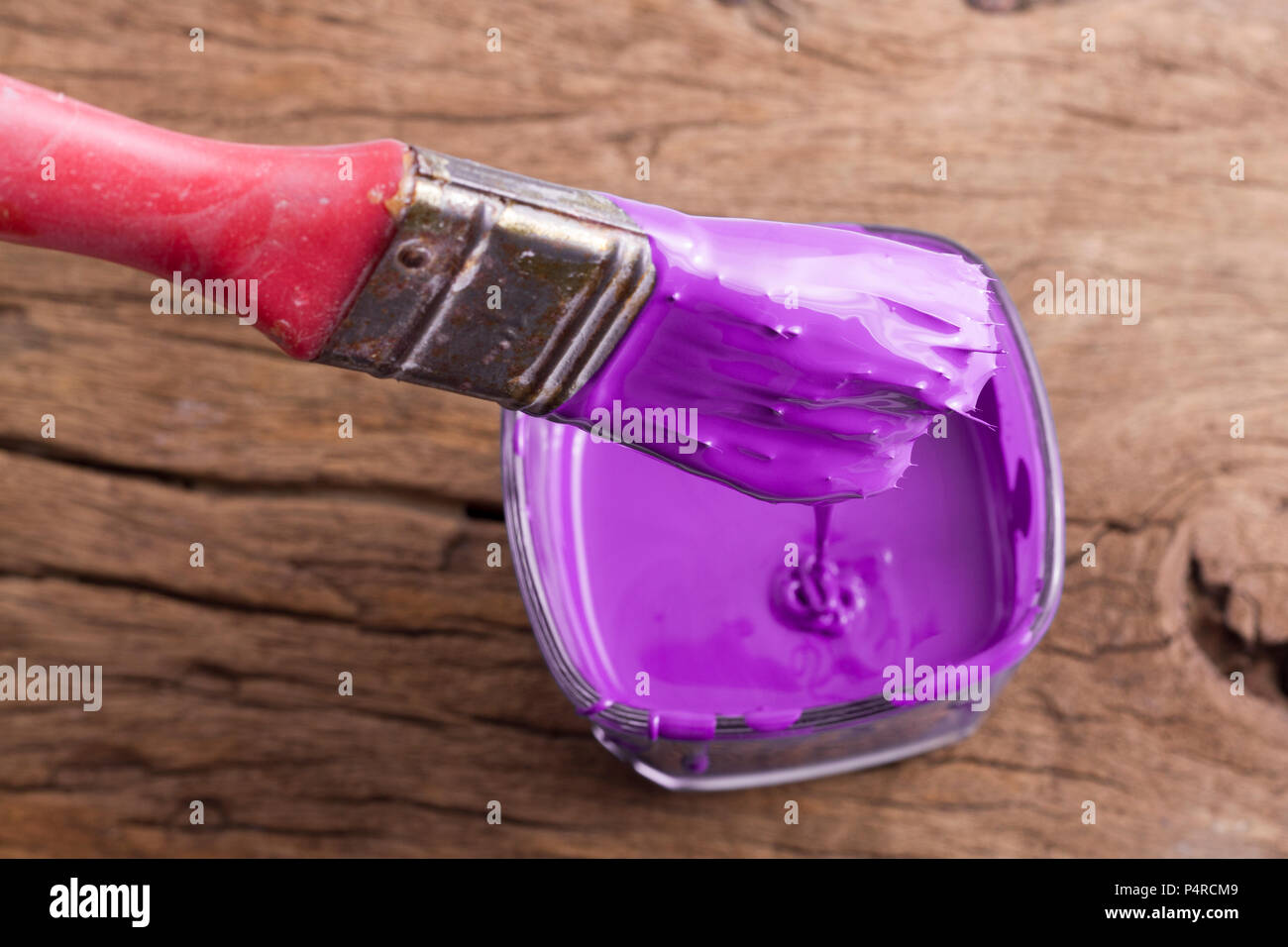 paint brushes with dripping paint on white background Stock Photo Alamy