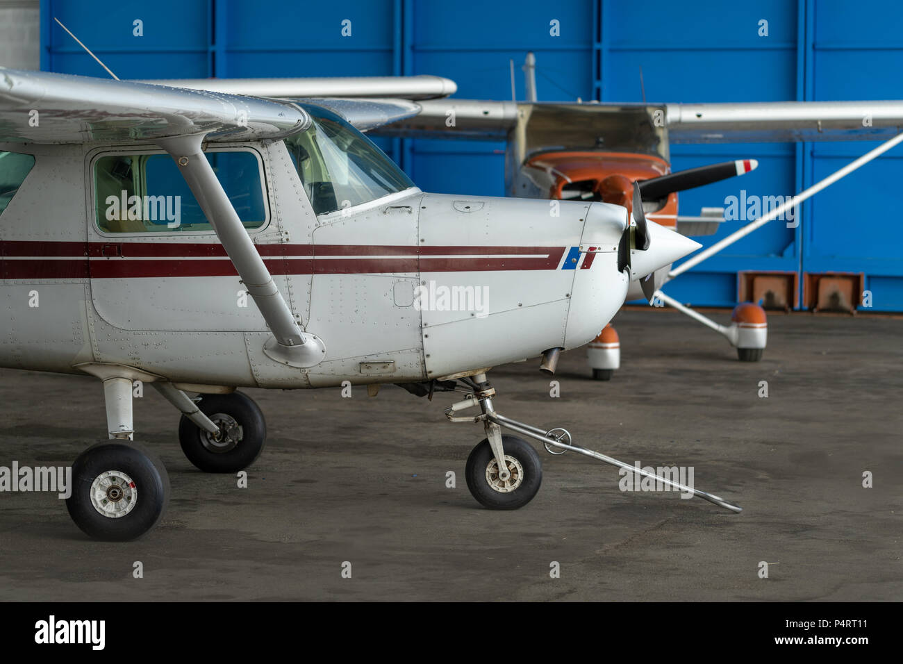 Small Sport Aircraft parked in hangar, close up. detail Stock Photo
