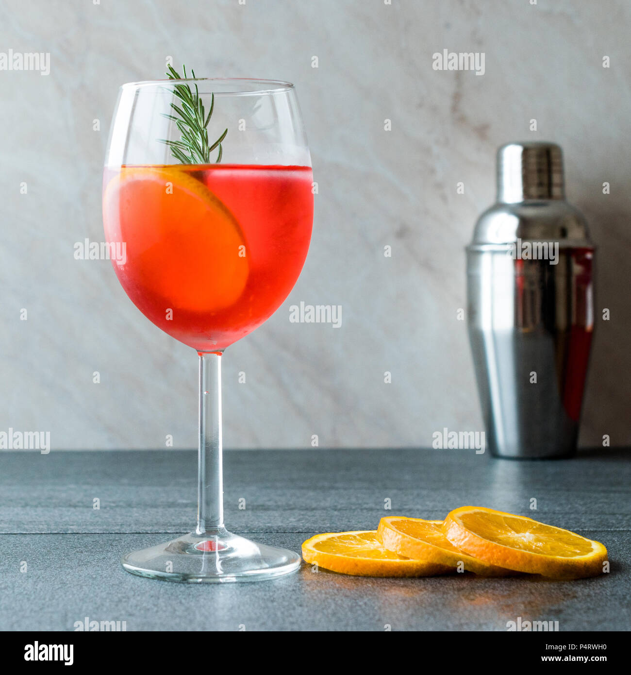 Aperol Spritz Cocktail with Orange Slice, Rosemary and Ice. Alcoholic