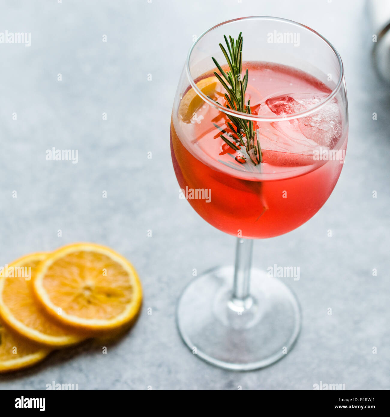 Aperol Spritz Cocktail with Orange Slice, Rosemary and Ice. Alcoholic