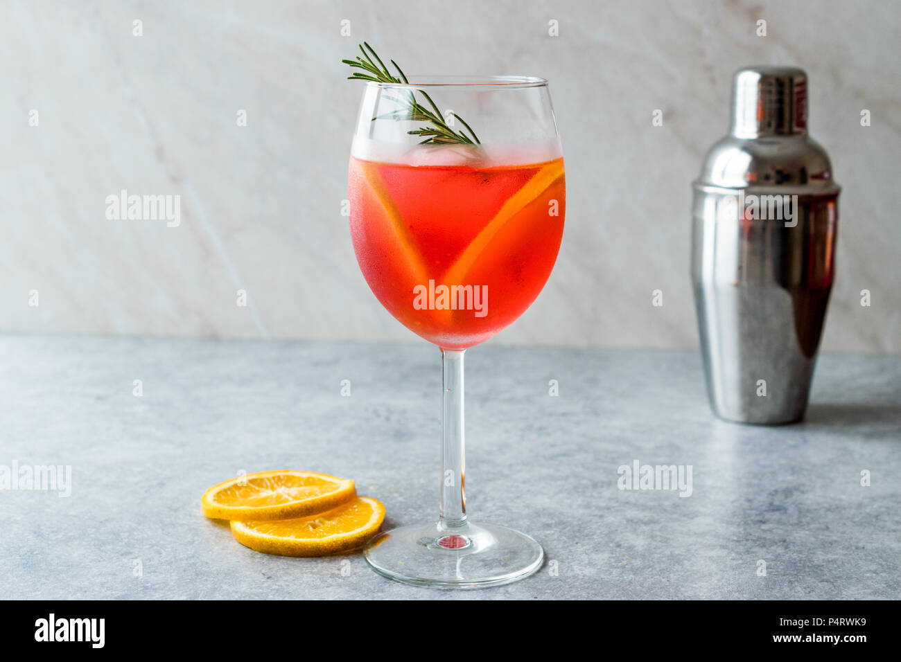 Aperol Spritz Cocktail with Orange Slice, Rosemary and Ice. Alcoholic