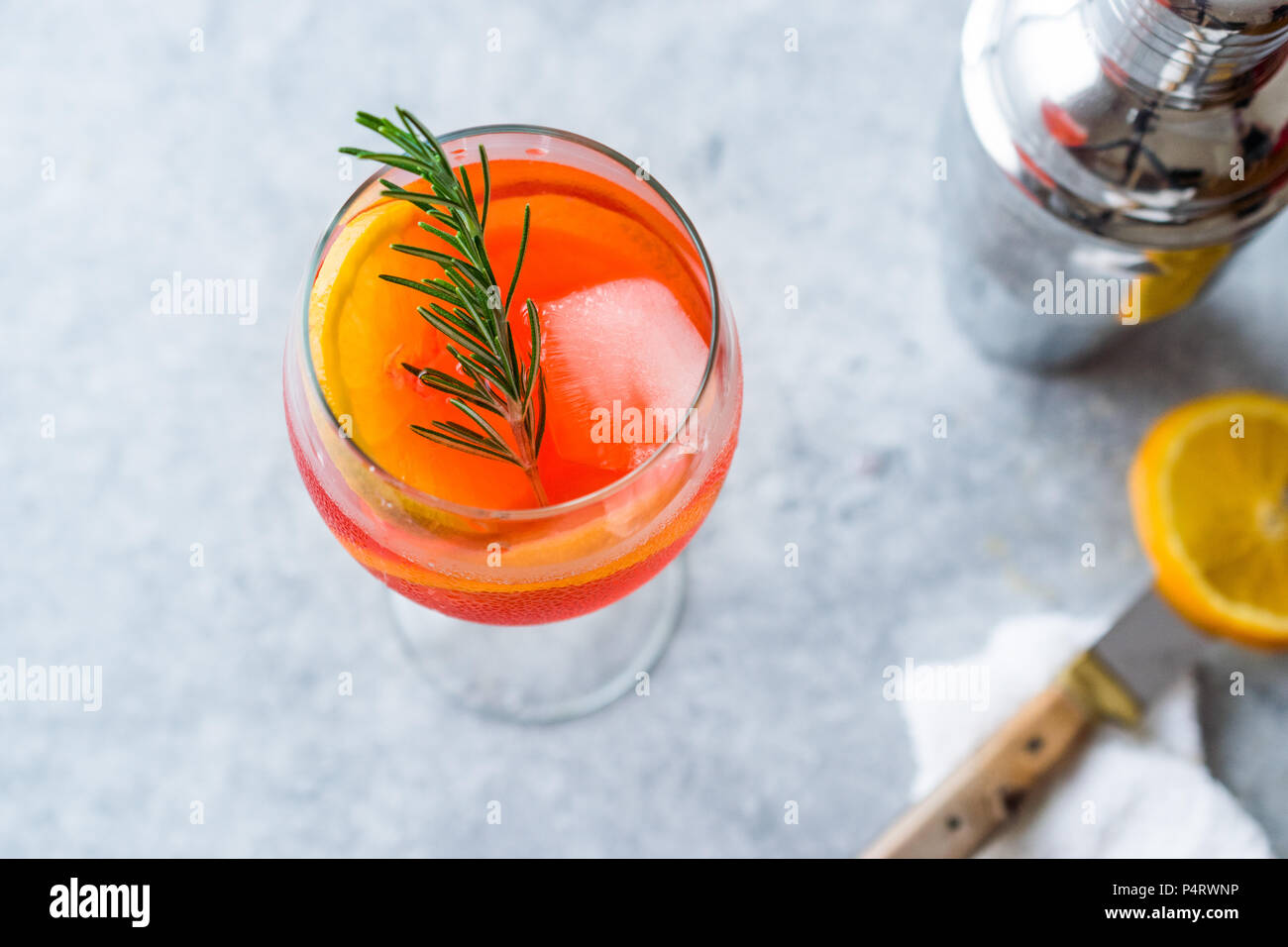 Aperol Spritz Cocktail with Orange Slice, Rosemary and Ice. Alcoholic