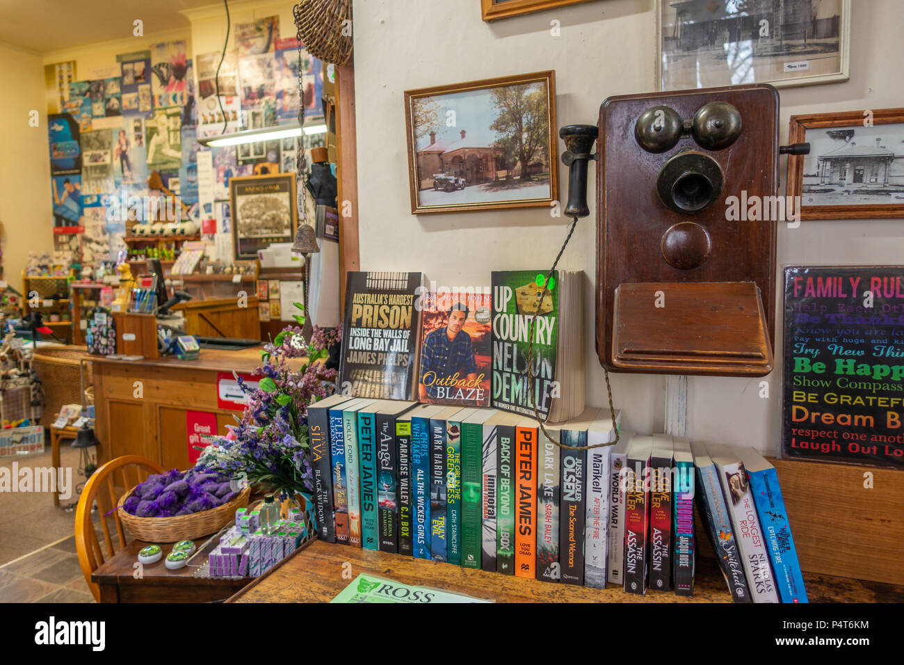 Antique wall telephone and interior of the post office in town. Ross, Tasmania, Australia. Stock Photo