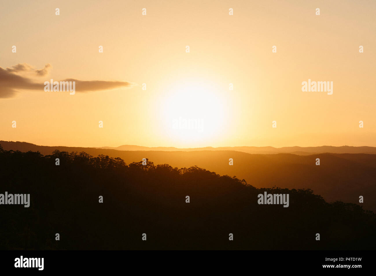 A beautiful sunset over the Sunshine Coast hinterland.  Located at Mapleton Falls, QLD, Australia. Stock Photo