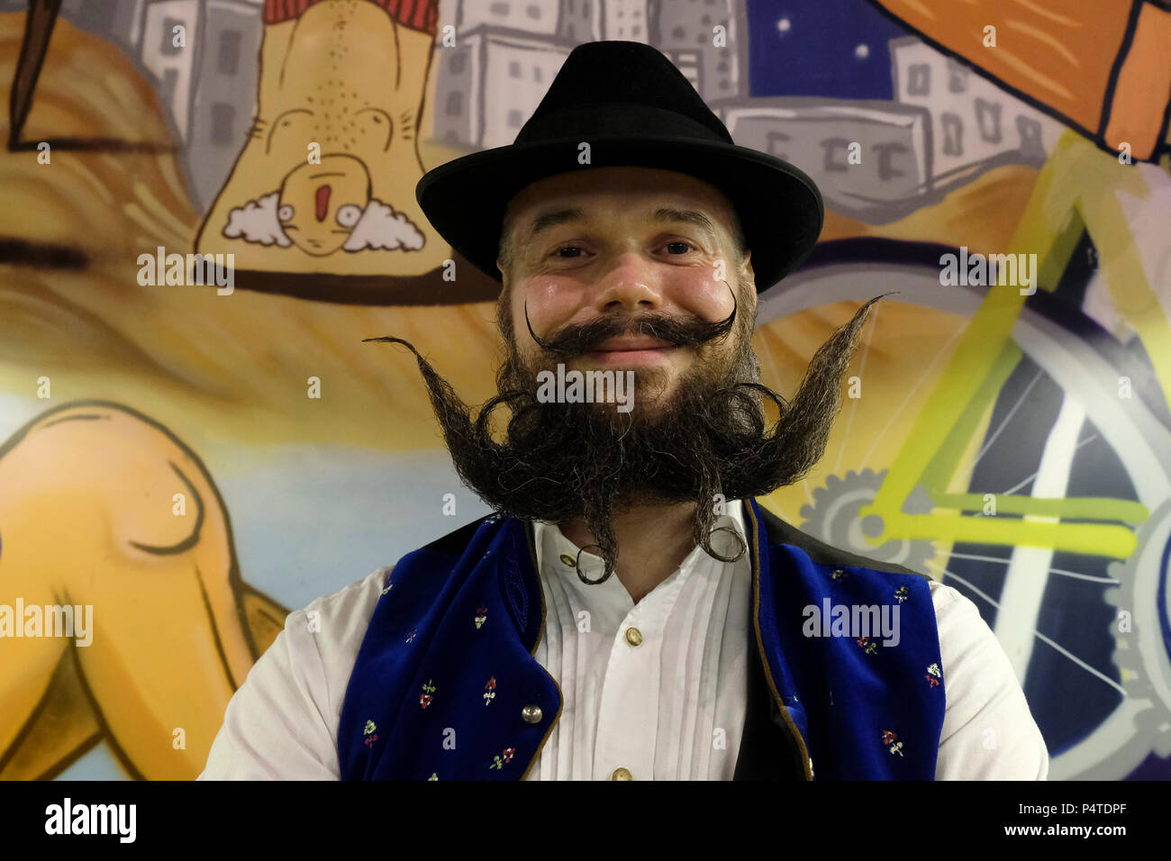 Tel Aviv, Israel, 22nd June 2018. German contestant in the Full Beard Freestyle category of the 'Open European Beard And Mustache Championship' poses for a picture during the championship which took place in Tel Aviv, Israel. 50 candidates from all over Europe took part in the contest conducted by The East Bavarian Beard and Moustache Club. Stock Photo