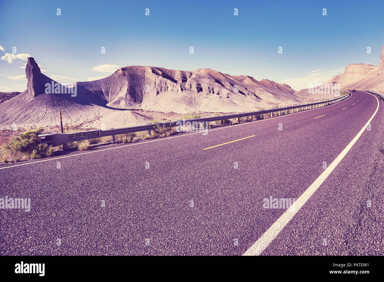 Retro stylized picture of a scenic mountainous road, Capitol Reef National Park, Utah, USA. Stock Photo