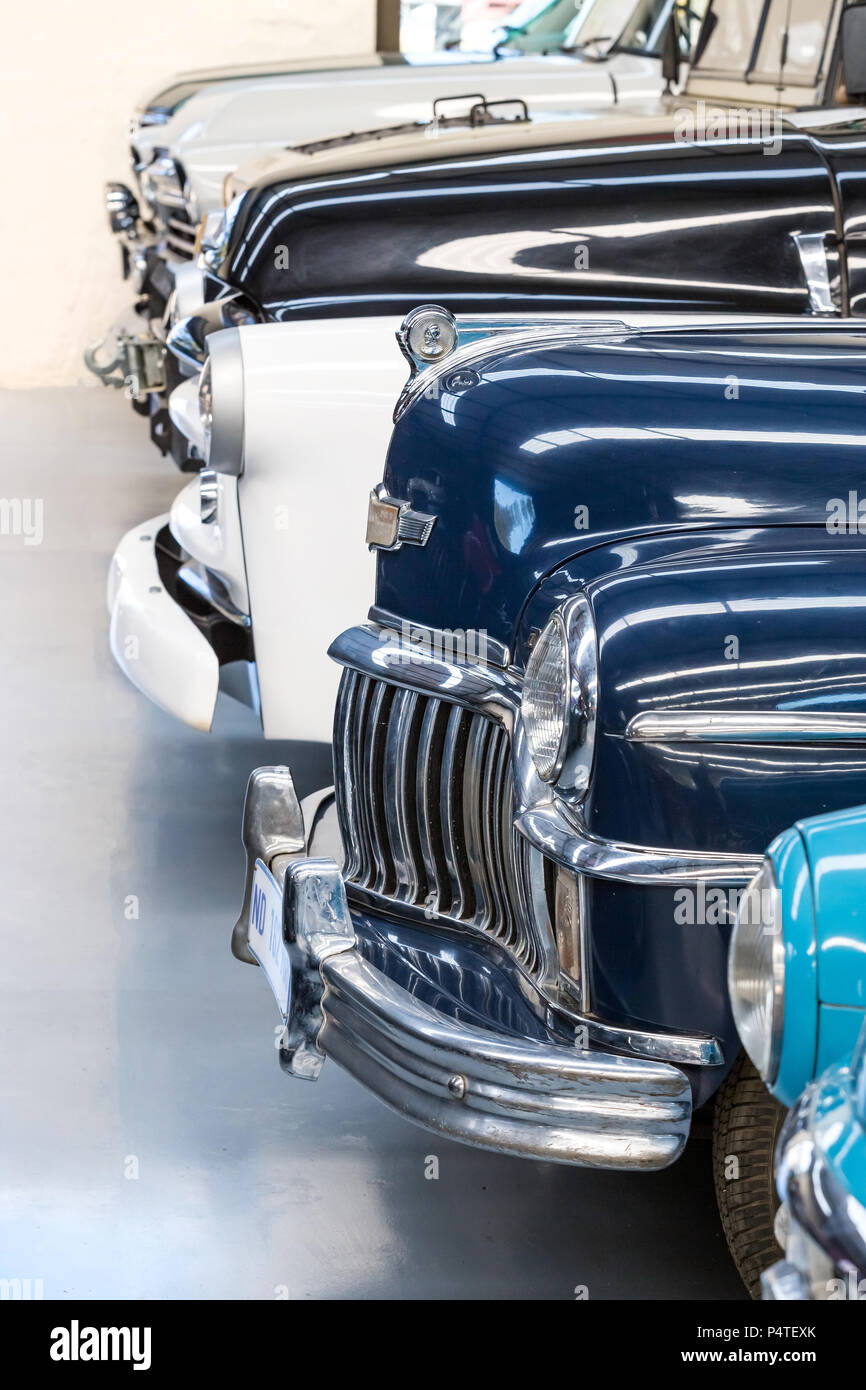 Pretoria, South Africa, June 1 - 2018: Classic cars on display in a warehouse. Stock Photo