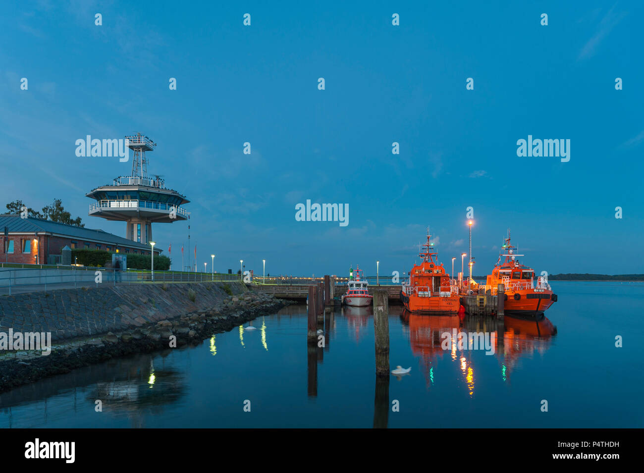 Pilot boats and control tower of the traffic control centre at the mouth of the Trave, Travemünde, Baltic Sea Stock Photo