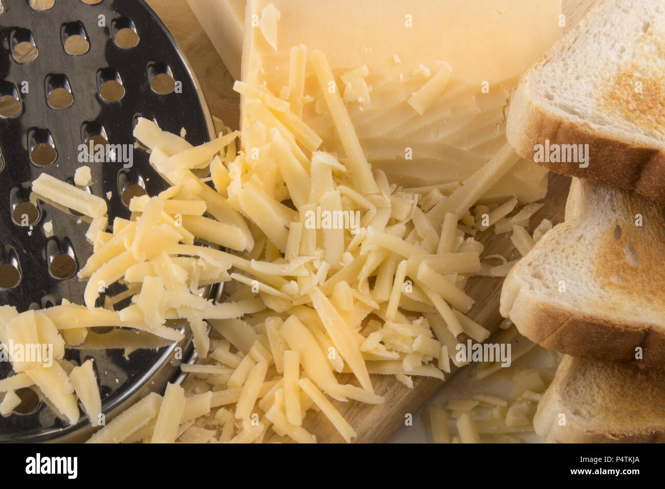 delicious grated irish organic mature cheddar cheese Stock Photo Alamy
