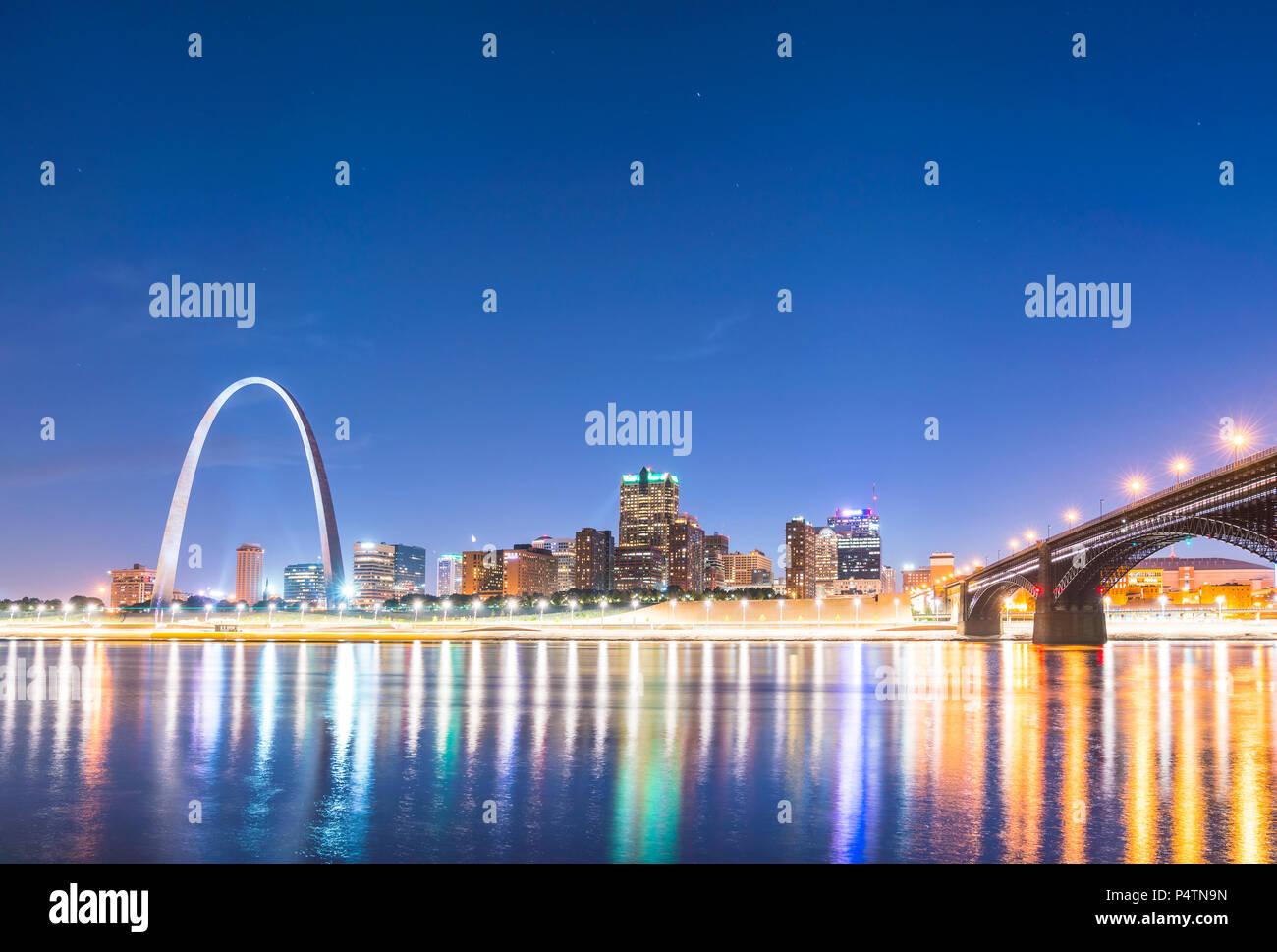st. louis skyscraper at night with reflection in river,st. louis,missouri,usa. Stock Photo