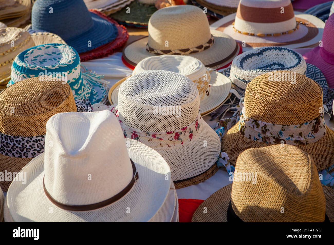 Display of reed hats in a sunny setting Stock Photo Alamy