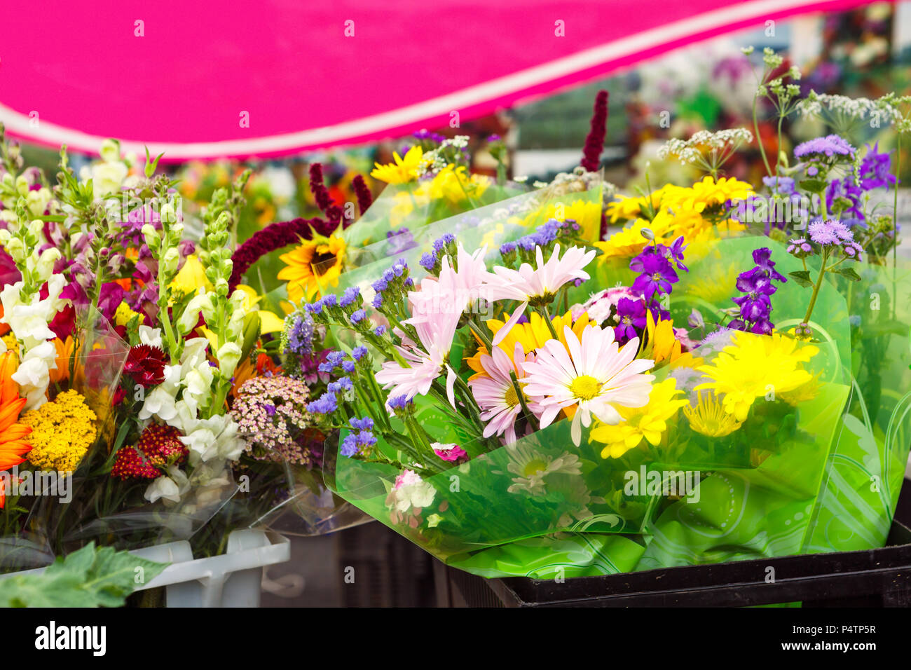 Flower Bunches for Sale at a Local Market Stock Photo