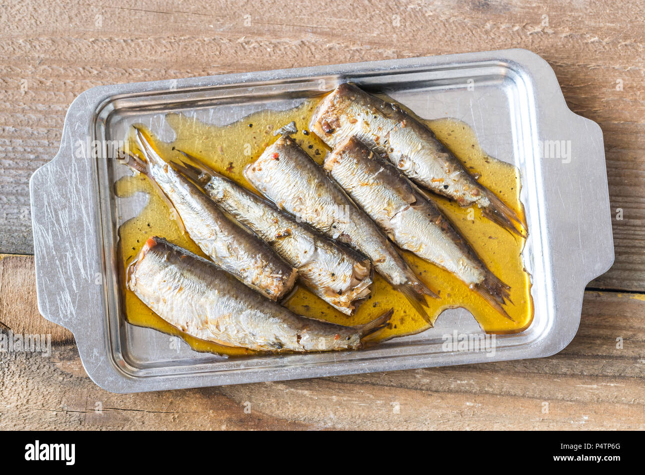 Sardines on the metal plate Stock Photo Alamy