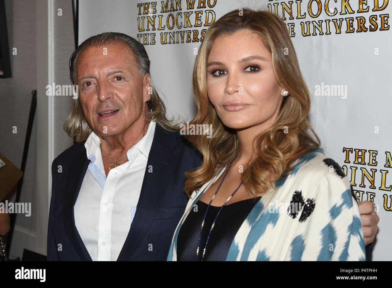 Armand Assante and Lola Tillyaeva attends the Premiere of 'The Man Who Unlocked The Universe' at The London West Hollywood on June 21, 2018 in West Hollywood, California. Stock Photo