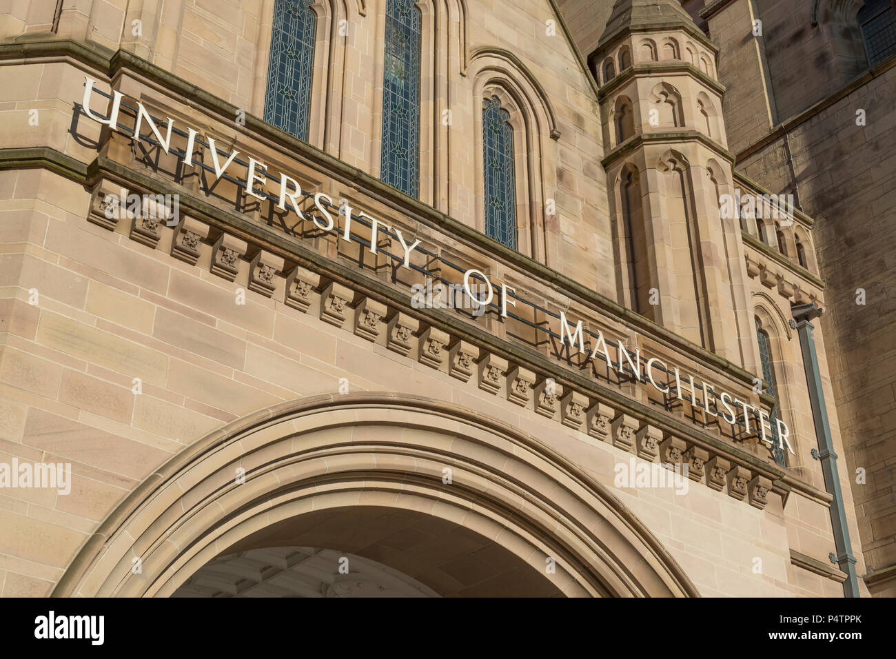 The signage of the Whitworth Building at The University of Manchester shot against a clear blue sky (Editorial use only). Stock Photo