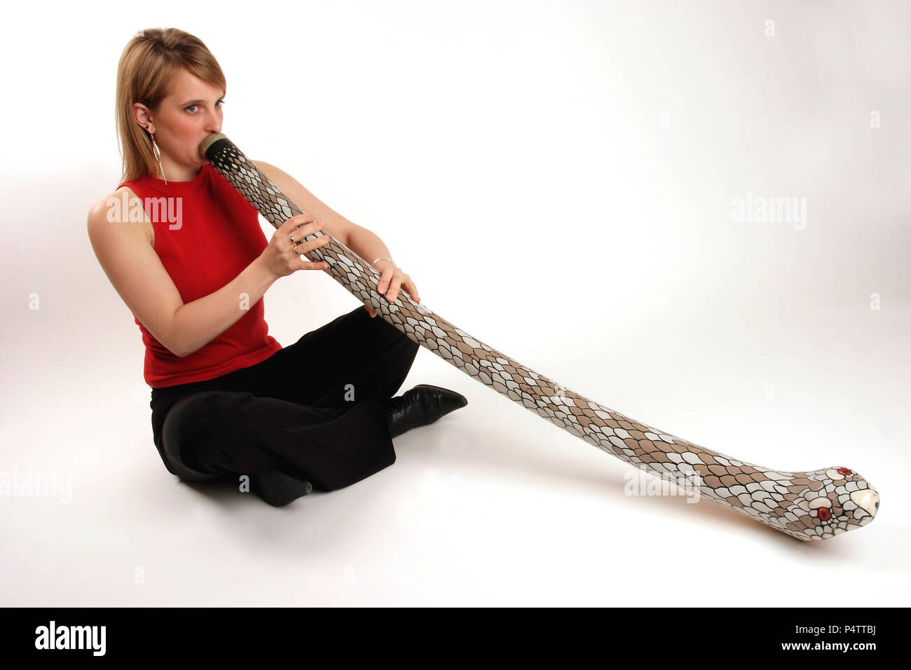 Didgeridoo - indigenous Australian wind instrument model release - Gemma Jones Stock Photo