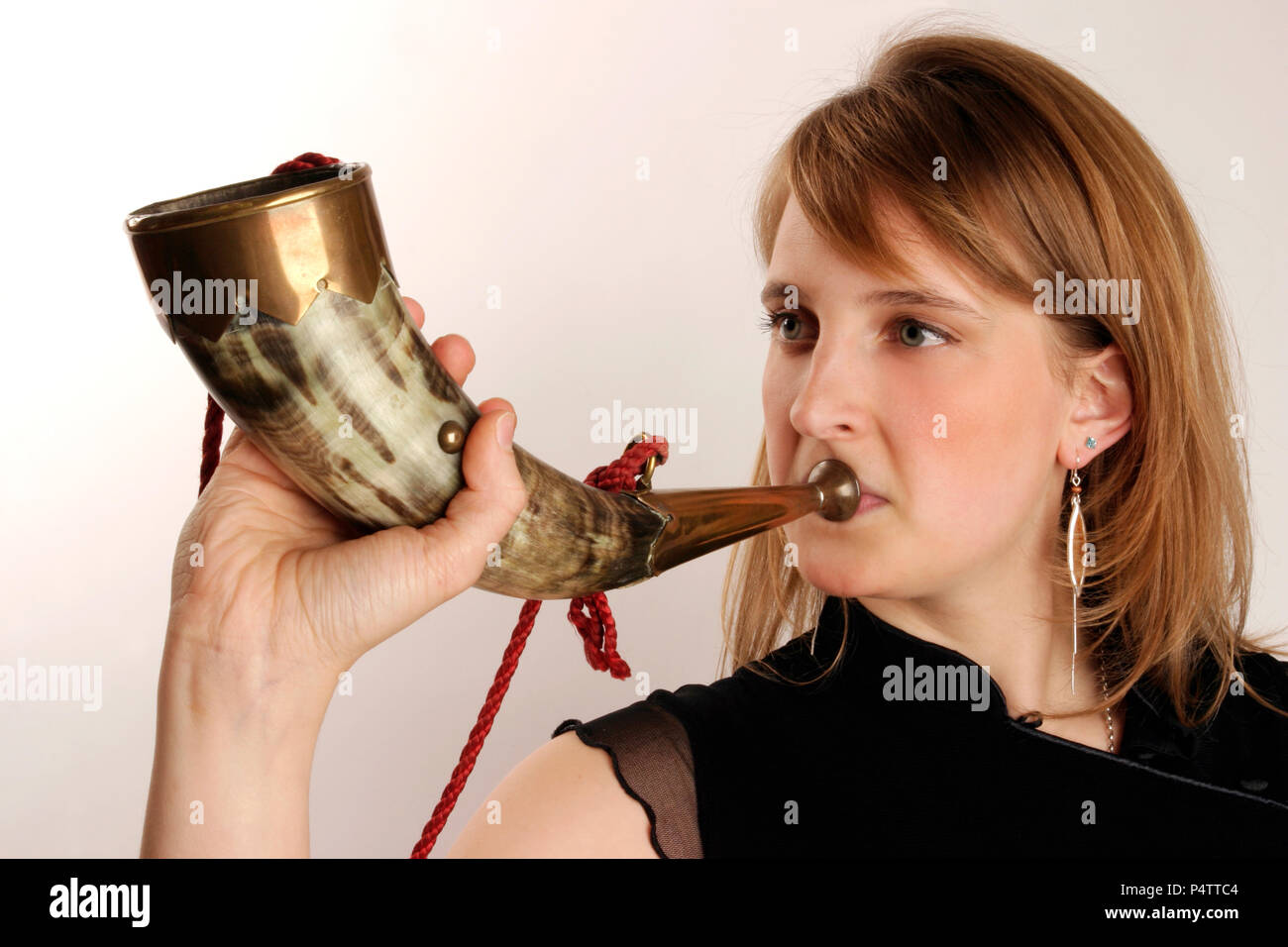 Young woman playing trumpet hires stock photography and images Alamy
