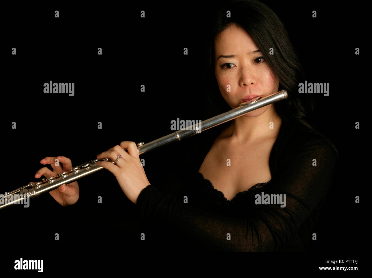 Oriental woman flute hires stock photography and images Alamy