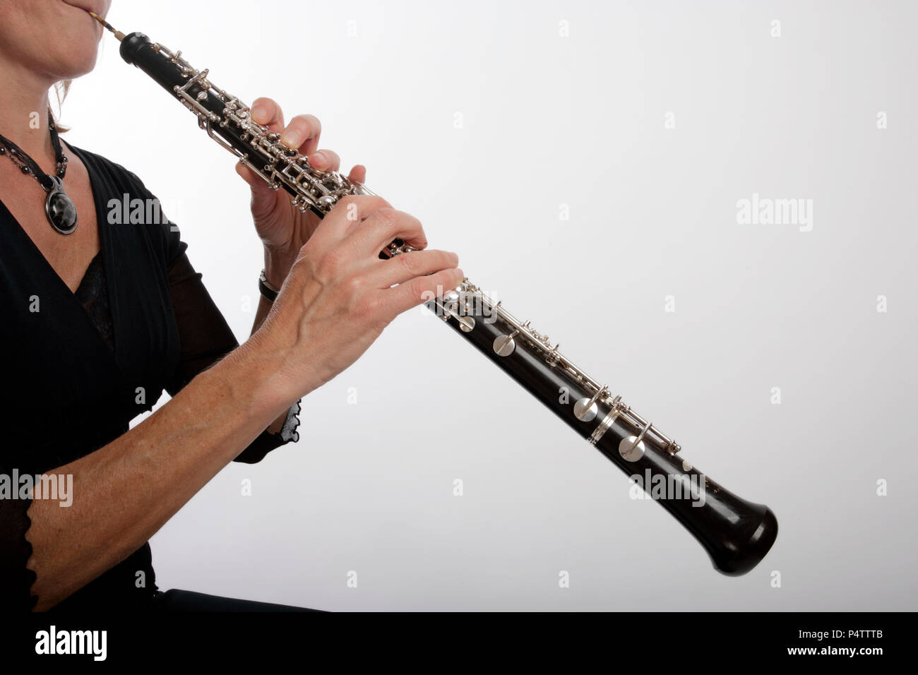 Oboe in playing position, oboist Stock Photo Alamy