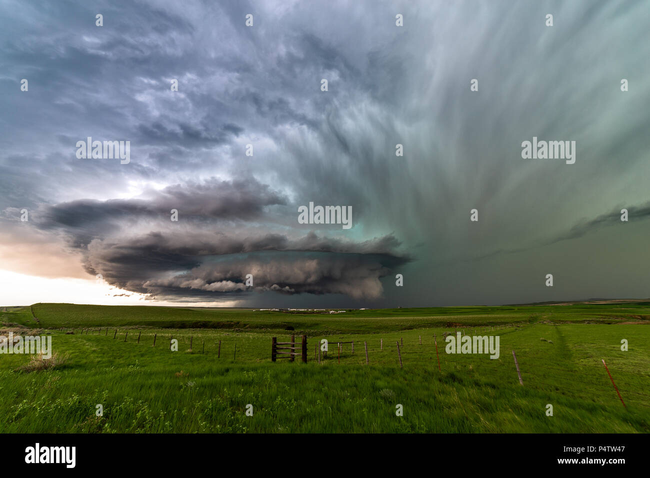 Ominous sky and supercell thunderstorm over a Great Plains landscape near Ryegate, Montana, USA Stock Photo
