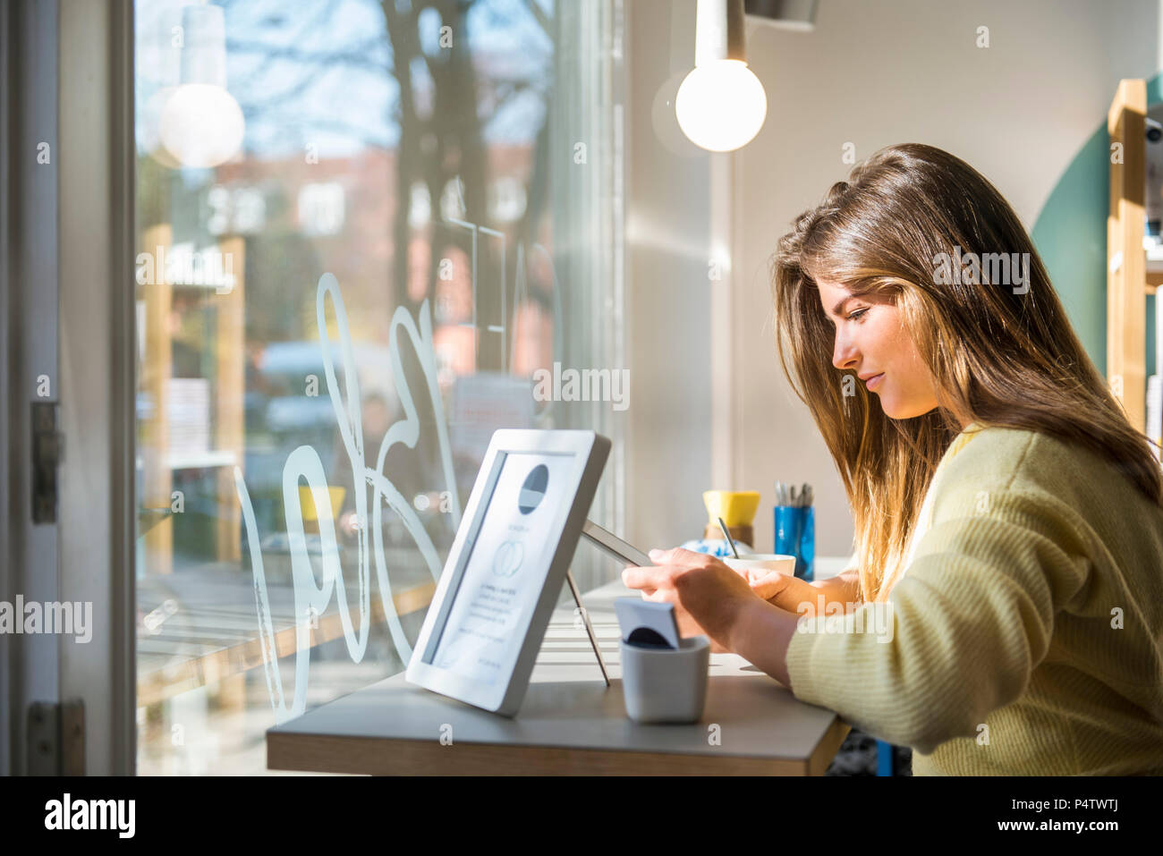 Young professional tablet work in hi res stock photography and images
