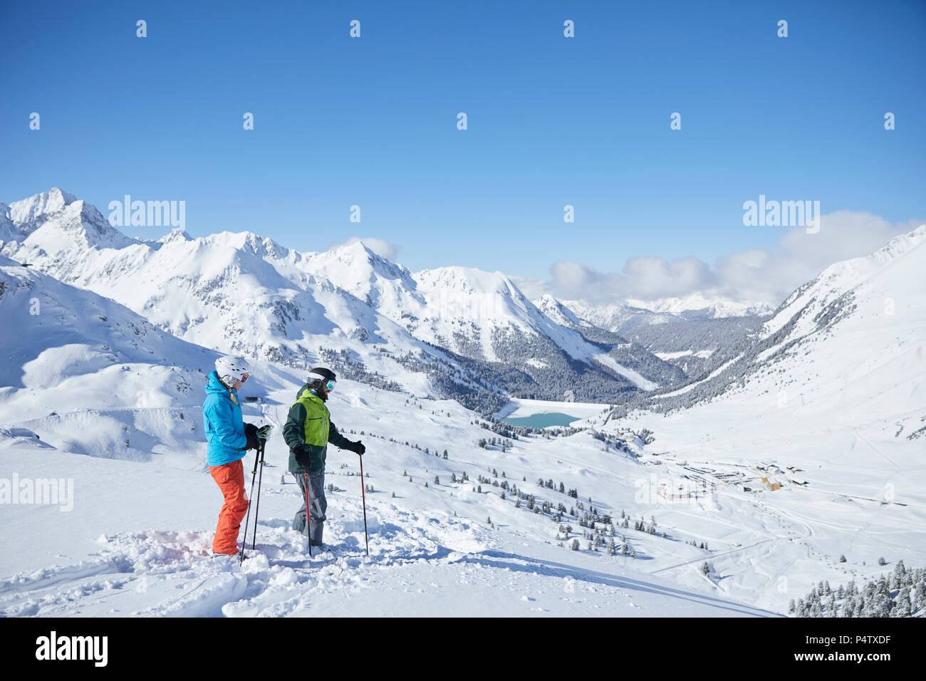 Austria, Tyrol, Kuehtai, two skiers in winter landscape Stock Photo