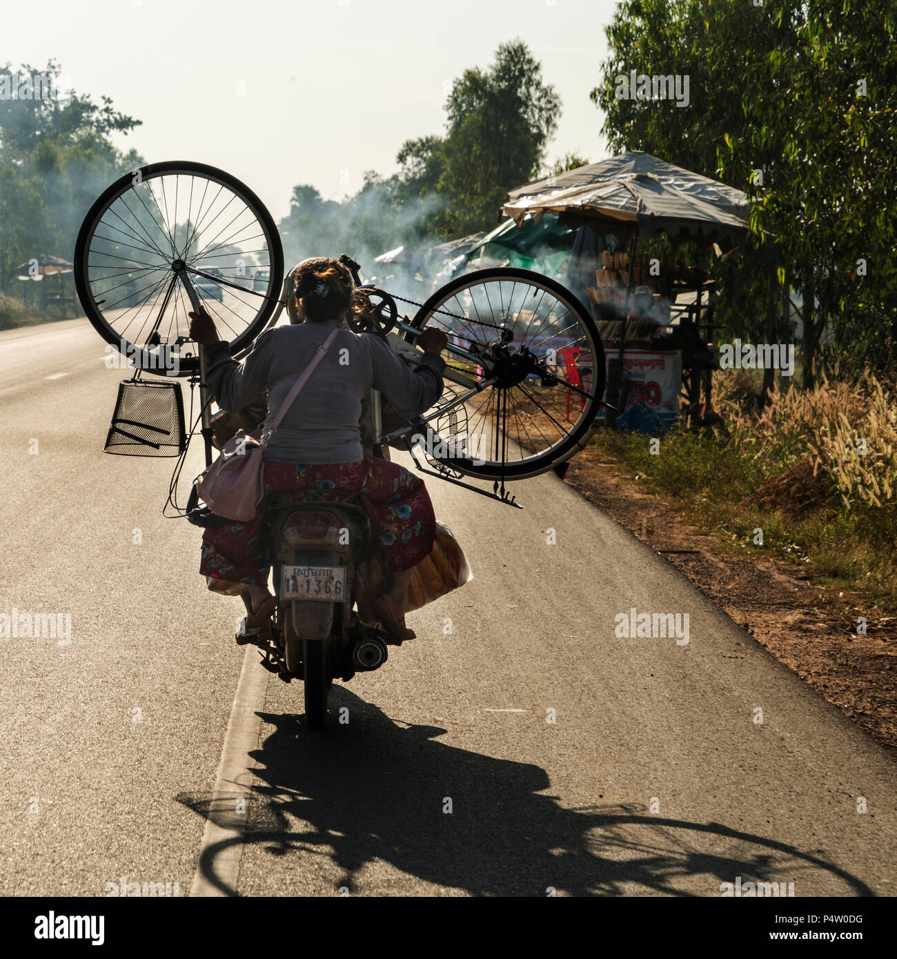 The road to Kampong Cham and the 'Bamboo Coconut rice' stalls Stock Photo