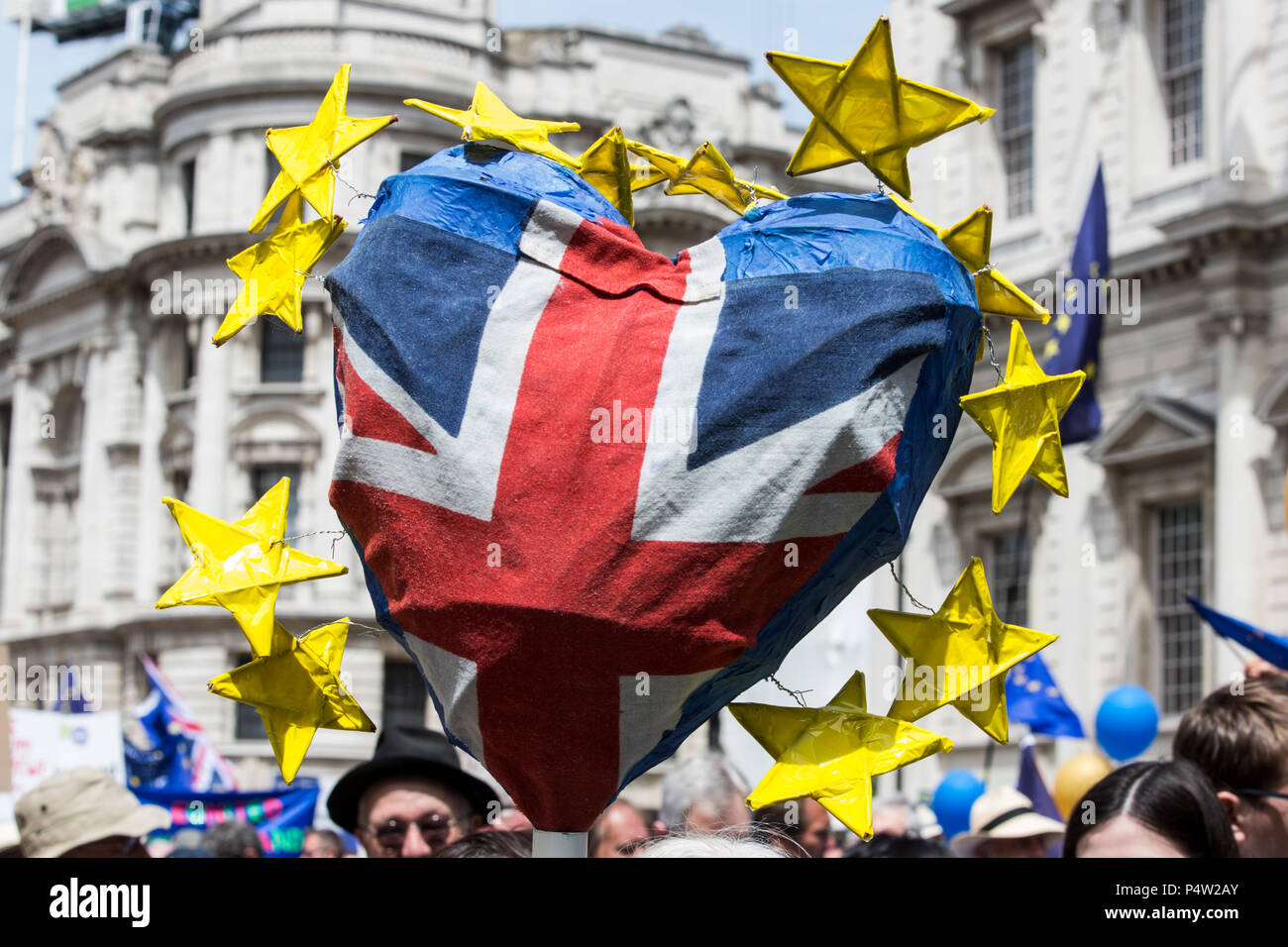 London, UK. 23 June 2018.Anti-Brexit march and rally for a People's Vote in Central London. Union Flag heart surrounded by the yellow stars of the European Union Flag. Stock Photo