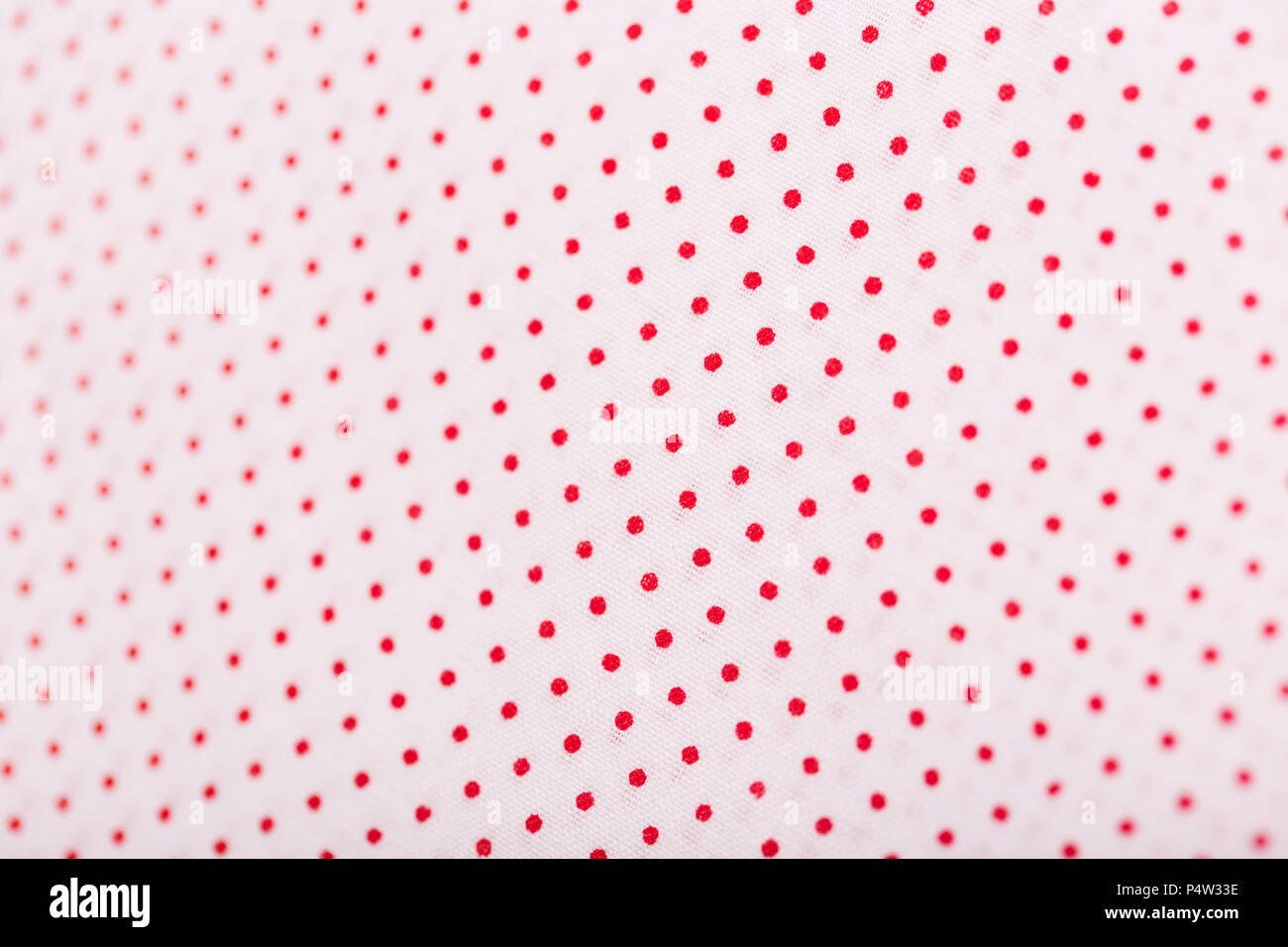 white cotton fabric with red polka dots Stock Photo - Alamy