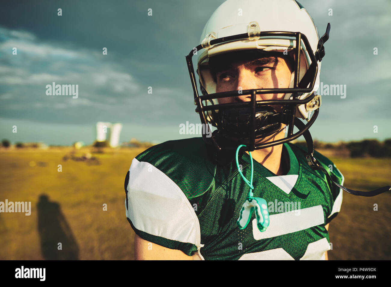 football helmet alone Lake (Uniontown) (OH) High School Mini 29 The Guardian Cap redesigned with the same materials and performance but a sleeker look Old Football Helmet On Black