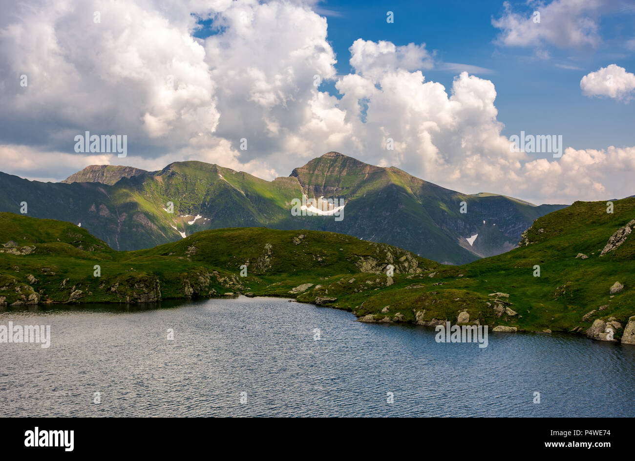 picturesque place around Capra glacier. beautiful mountainous summer landscape on high altitude. lovely travel background Stock Photo