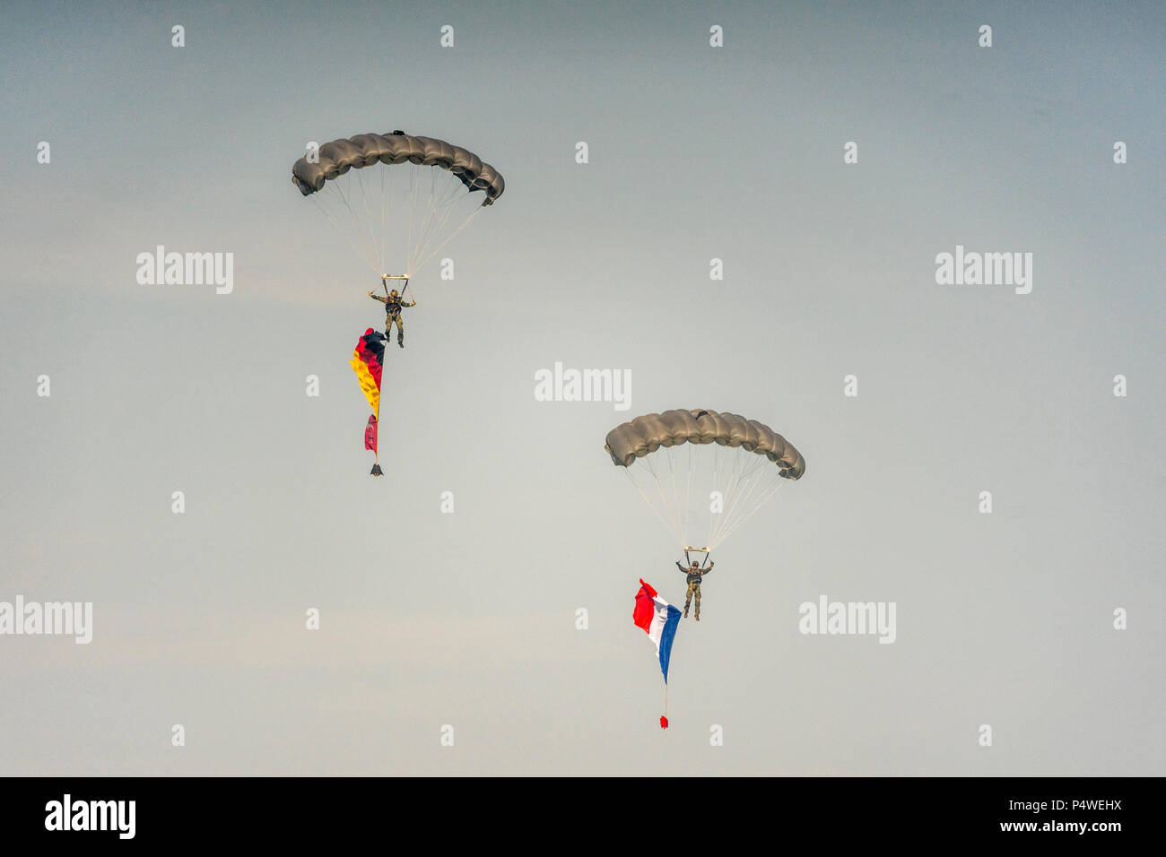 Paratroopers demonstrating their skills at the International Aerospace Exhibition ILA at Airport Schoenefeld in Berlin, Germany 2018. Stock Photo