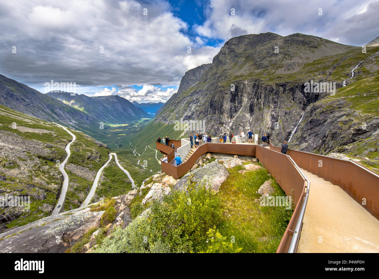 Tourists on viewing balcony at Trollstigen road tourist attraction in More og Romsdal region Norway Stock Photo
