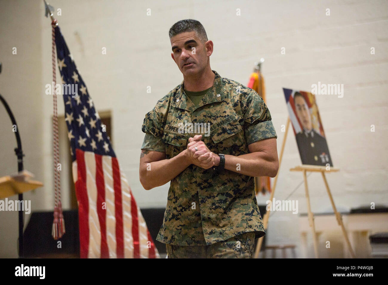 U.S. Marine Corps Lt. Col. Scott W. Zimmerman, battalion commander of 2d Combat Engineer Battalioin, gives a reflection during the memorial service for 1st Lt. Garrett C. Cheung on Camp Lejeune, N.C., May 9, 2017. 1st Lt. Cheung is survived by his parents, ALexander and Florence Cheung and his sister, Brigette. Stock Photo