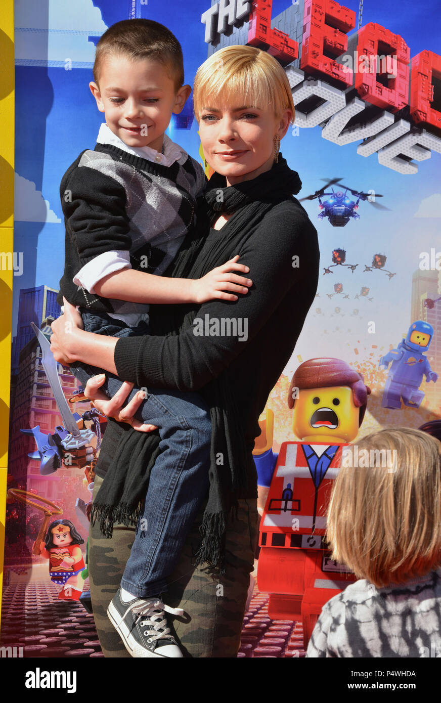 Dezi James Calvo; Jaime Pressly 137- arriving at The Lego Movie Premiere at the Westwood Village Theatre in Los Angeles.Dezi James Calvo; Jaime Pressly 137- ------------- Red Carpet Event, Vertical, USA, Film Industry, Celebrities,  Photography, Bestof, Arts Culture and Entertainment, Topix Celebrities fashion /  Vertical, Best of, Event in Hollywood Life - California,  Red Carpet and backstage, USA, Film Industry, Celebrities,  movie celebrities, TV celebrities, Music celebrities, Photography, Bestof, Arts Culture and Entertainment,  Topix, vertical,  family from from the year , 2014, inquiry Stock Photo