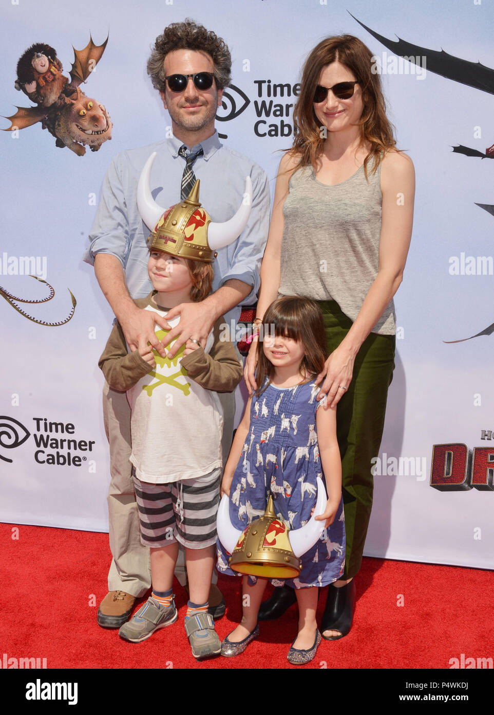 Kathryn Hahn and husband, son and daughter at the How To Train Your Dragon 2 Premiere at the Regency Village Westwood in Los Angeles.Kathryn Hahn and husband, son and daughter ------------- Red Carpet Event, Vertical, USA, Film Industry, Celebrities,  Photography, Bestof, Arts Culture and Entertainment, Topix Celebrities fashion /  Vertical, Best of, Event in Hollywood Life - California,  Red Carpet and backstage, USA, Film Industry, Celebrities,  movie celebrities, TV celebrities, Music celebrities, Photography, Bestof, Arts Culture and Entertainment,  Topix, vertical,  family from from the y Stock Photo