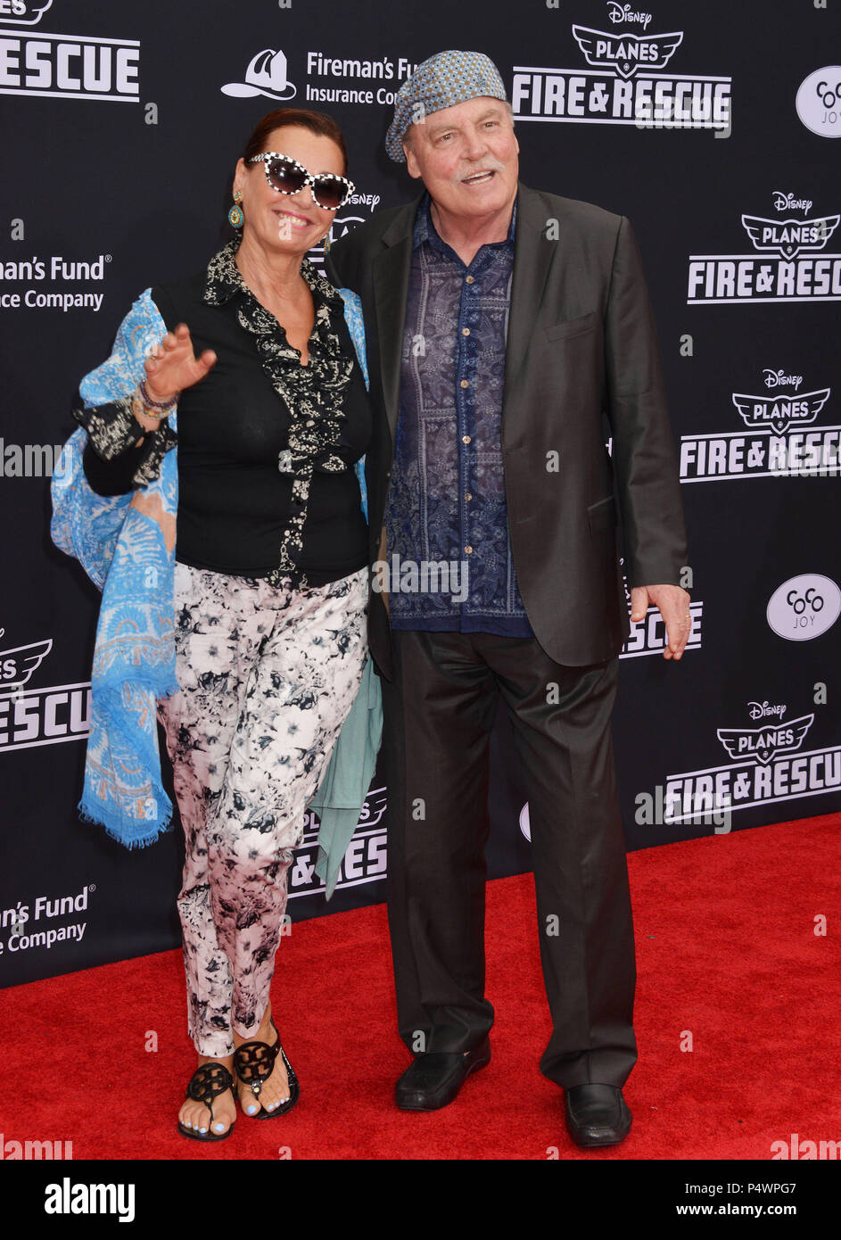 Stacy Keach and wife at the Planes, Fire and Rescue Premiere at the El Capitan Theatre in Los Angeles.   Stacy Keach and wife 065 ------------- Red Carpet Event, Vertical, USA, Film Industry, Celebrities,  Photography, Bestof, Arts Culture and Entertainment, Topix Celebrities fashion /  Vertical, Best of, Event in Hollywood Life - California,  Red Carpet and backstage, USA, Film Industry, Celebrities,  movie celebrities, TV celebrities, Music celebrities, Photography, Bestof, Arts Culture and Entertainment,  Topix, vertical,  family from from the year , 2014, inquiry tsuni@Gamma-USA.com Husban Stock Photo