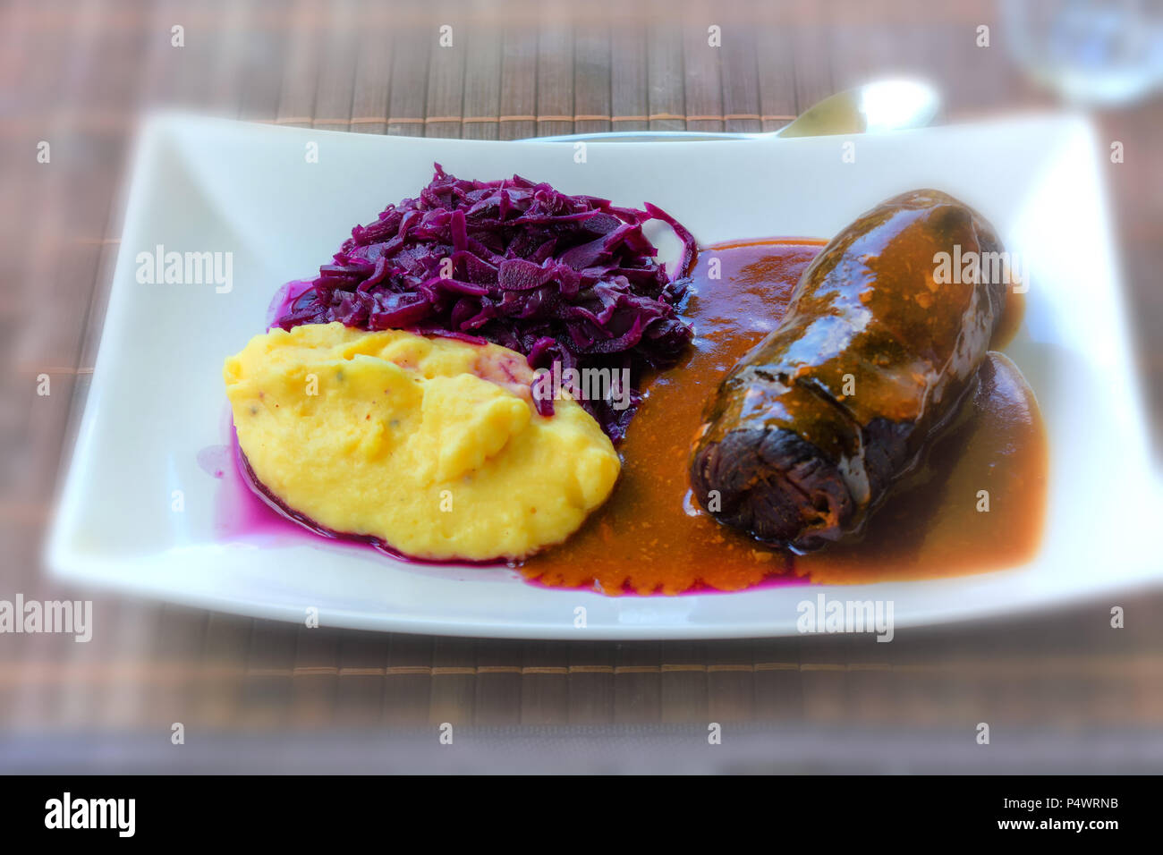 Beef roulade with red cabbage and mashed potatoes Stock Photo Alamy